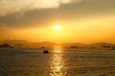 Güneş Batı kowloon promenade, hong kong ayarla