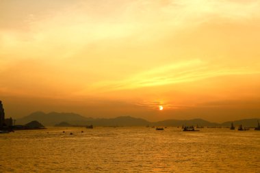 Güneş Batı kowloon promenade, hong kong ayarla
