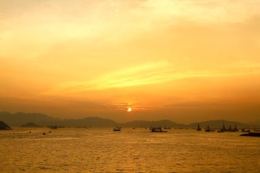 Güneş Batı kowloon promenade, hong kong ayarla