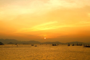 Güneş Batı kowloon promenade, hong kong ayarla