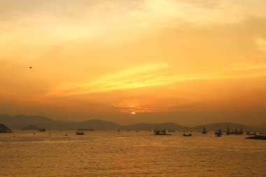 Güneş Batı kowloon promenade, hong kong ayarla