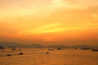 Güneş Batı kowloon promenade, hong kong ayarla