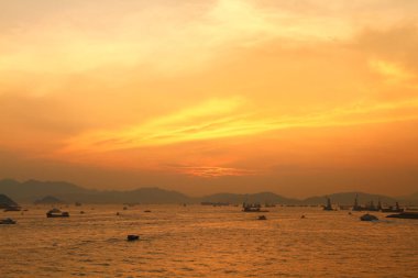 Güneş Batı kowloon promenade, hong kong ayarla