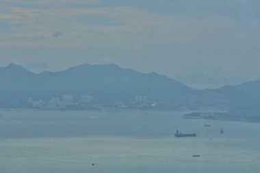 TST gün batımında Hong Kong Silueti