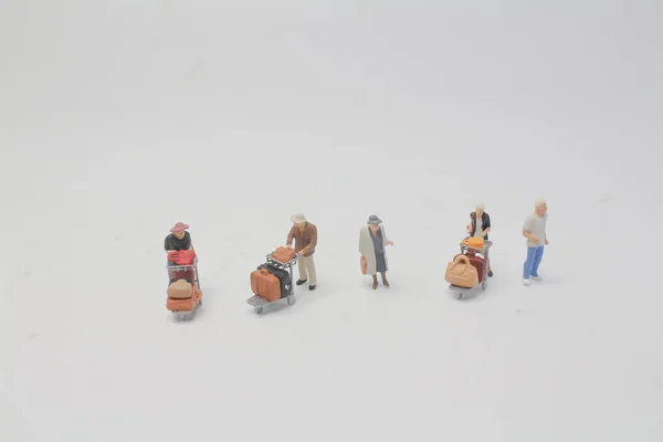 Die Minifigur Mit Trolley Mit Federweg — Stockfoto