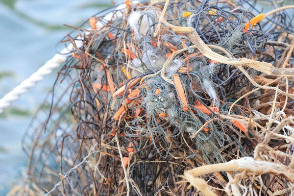 A tangled mess of fishing nets plastic rope 