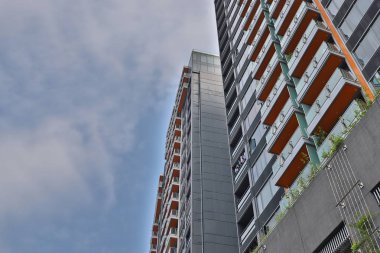 Anne üzerinde Shan, orta sınıf daire