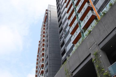 Anne üzerinde Shan, orta sınıf daire