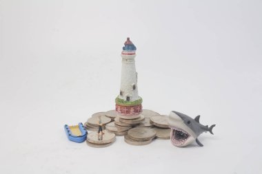 jeton yakalamak sikke yığını üzerinde mini bir Fisher adam 