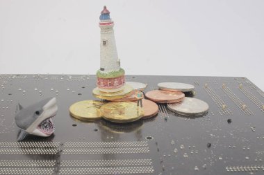 jeton yakalamak sikke yığını üzerinde mini bir Fisher adam 