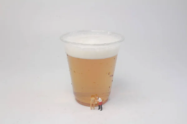 the fun of figure filling a beer
