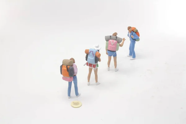 the group mini people figure standing on