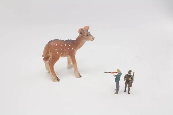 the mini figure  hunter  shoot a deer
