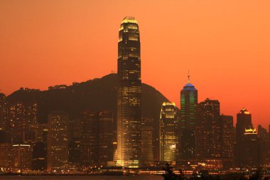 gün batımı Kowloon yan görünümden victoria Harbor'da 