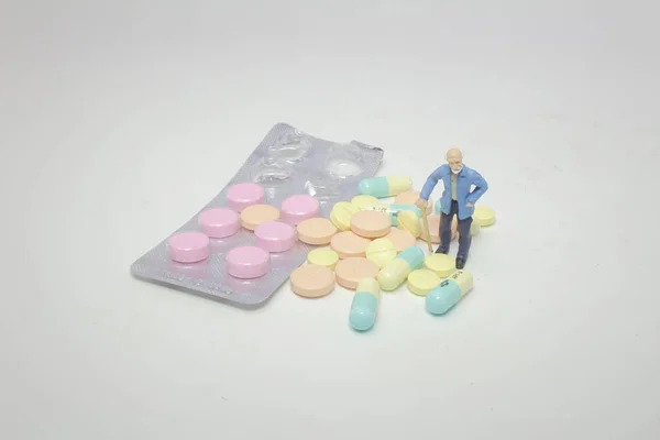 Small Figure Old Man Pill — Stock Photo, Image