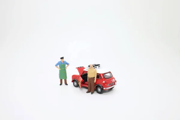 Een Schaal Van Mini Cooper Met Figuur — Stockfoto