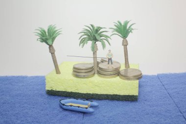 İş adamı ve sikke yığını rakam