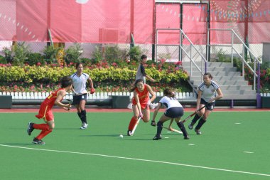 bir kadın hokey maçında Asya oyunu