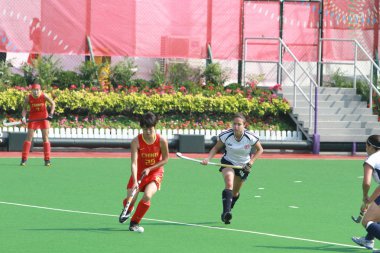 bir kadın hokey maçında Asya oyunu