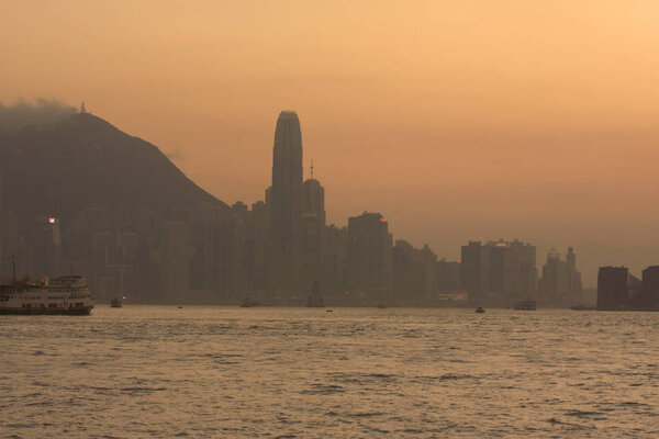 the sunset of victoria harbour view at ship