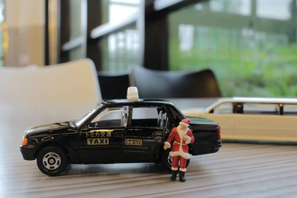 Figura de Santa Claus en taxi — Foto de Stock