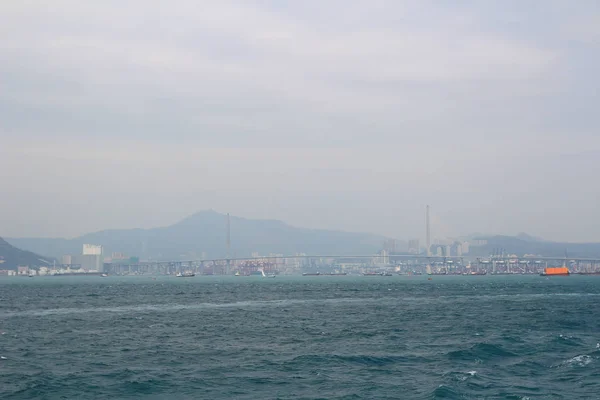 Un paisaje de hong kong puerto tiempo del día — Foto de Stock