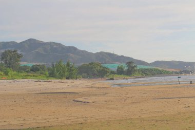 Ha pak nai hong kong'da gün batımı plajı 