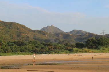 Ha pak nai hong kong'da gün batımı plajı 