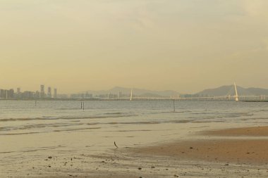 Ha pak nai hong kong'da gün batımı plajı 