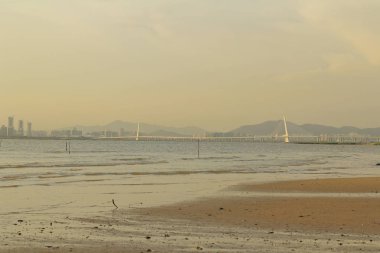 Ha pak nai hong kong'da gün batımı plajı 