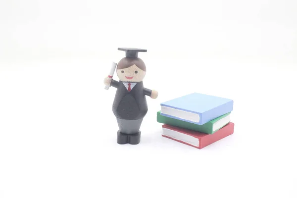 The theme of mini figure Graduation Concept — Stock Photo, Image