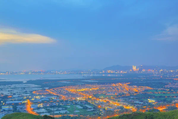 Hong kong yuen lang centrum zonsondergang — Stockfoto