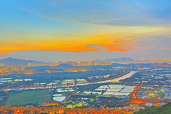 Hong kong yuen lang centrum zonsondergang — Stockfoto