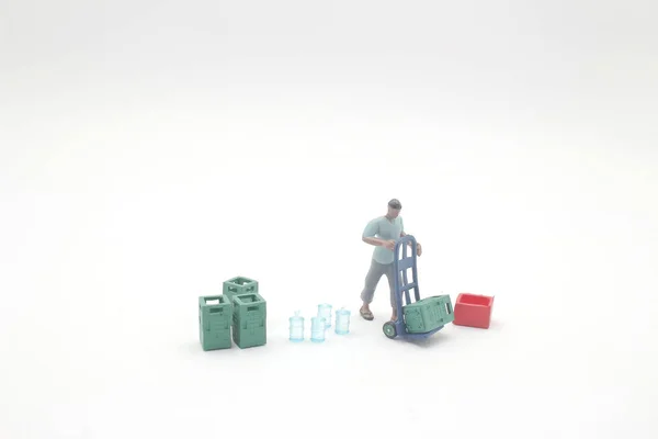 Mini figure, workers, employee staffs help move — Stock Photo, Image