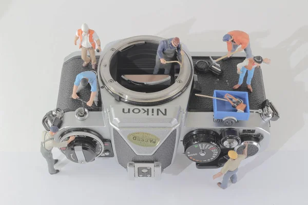 Figura mini ludzie, usługi kamery — Zdjęcie stockowe