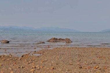 yaz aylarında bir Nai Chung Çakıl Plajı