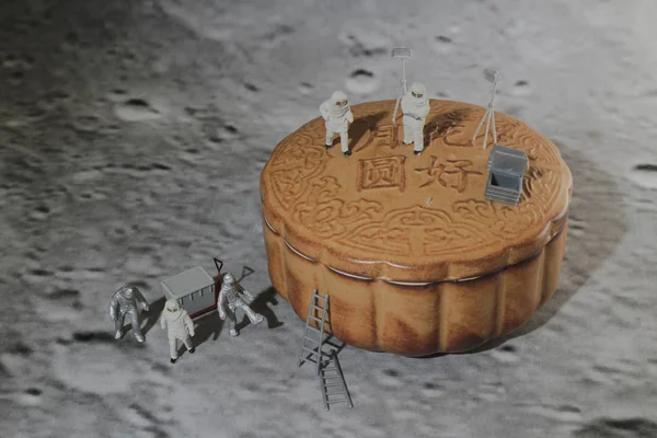 a fun of spacemen walk on the moon cake