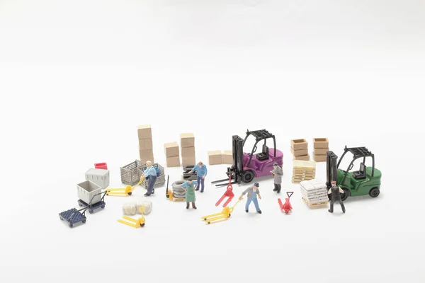 Mini Of Figure Worker, Construction and Logistics Concept — стоковое фото