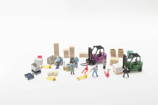 Mini-Figurenarbeiter, Bau- und Logistikkonzept — Stockfoto