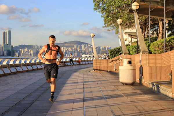 The runner run at the Wan Chai Waterfront Promenade, 19 June 2020