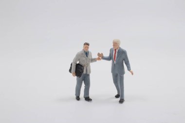 Çeşitli iş adamları. Bir grup devamlı iş adamı.,