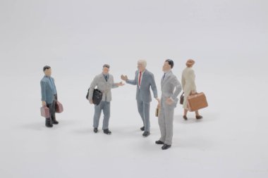 Çeşitli iş adamları. Bir grup devamlı iş adamı.,