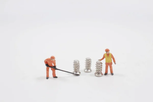Mini Worker Pick Screw — Stock Photo, Image