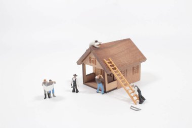 Mavi Harita 'daki küçük işçi figürü. Yuvarlak, konut.