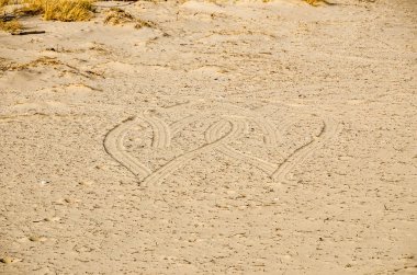 Bir diğer overlaying kumla kalbimizde