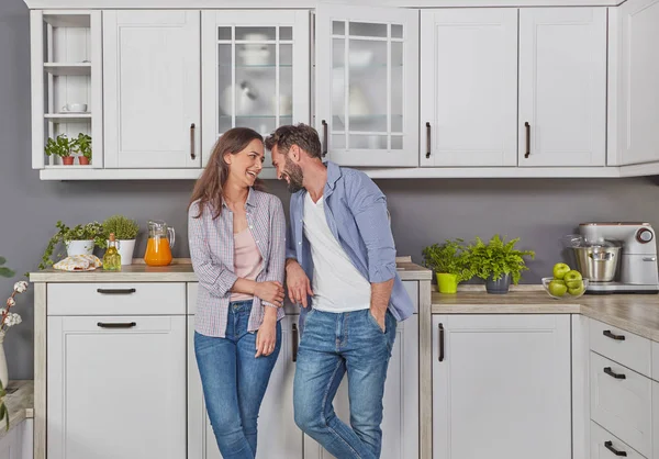 Young couple in love in the kitchen