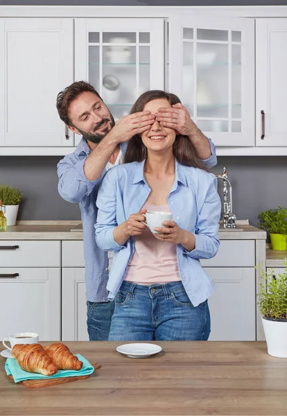 Young couple in love in the kitchen