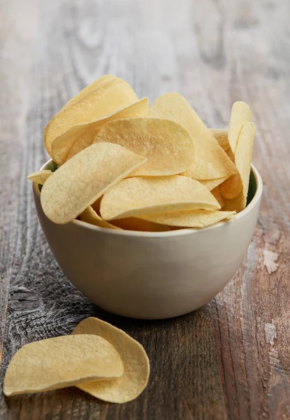 Potato chips on table
