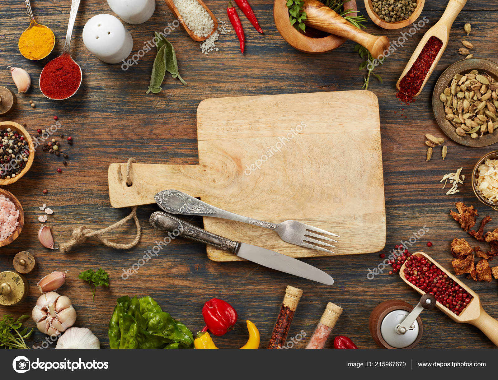 https://st4.depositphotos.com/6235482/21596/i/1600/depositphotos_215967670-stock-photo-cooking-ingredients-cutting-board.jpg