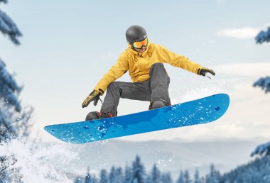 Snowboarder performing a jump clipart
